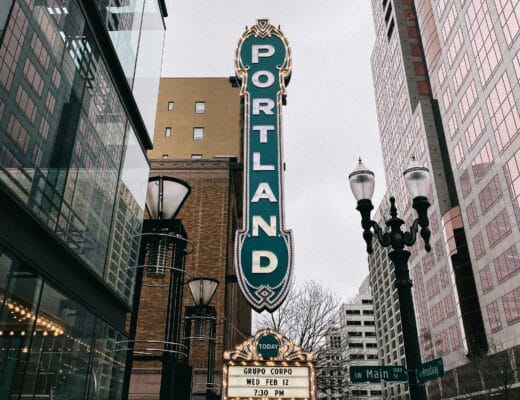 A blue “Portland” sign on a building