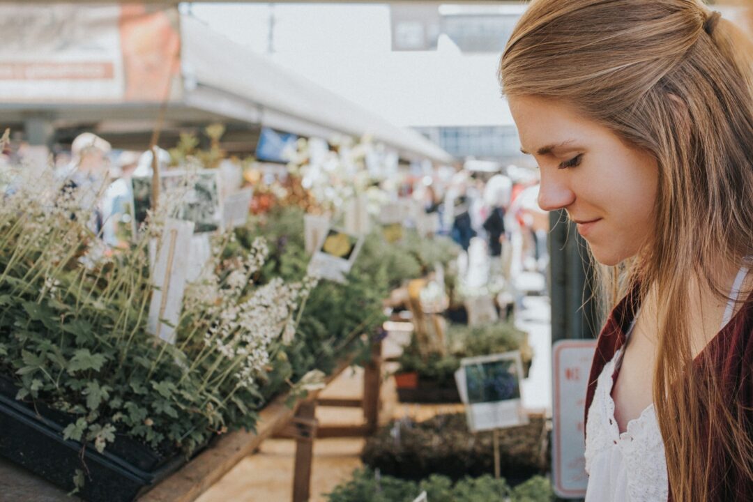 A woman at a farmer’s market.